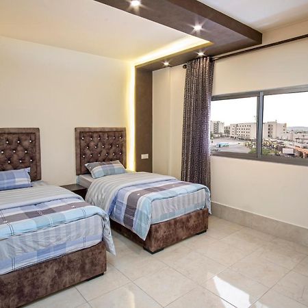 Al Riyati Hotel Apartments Акаба Экстерьер фото