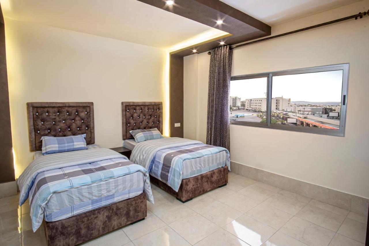 Al Riyati Hotel Apartments Акаба Экстерьер фото