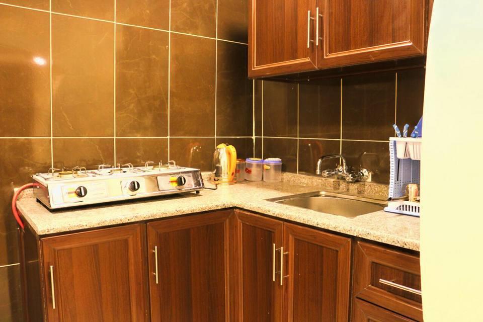Al Riyati Hotel Apartments Акаба Экстерьер фото