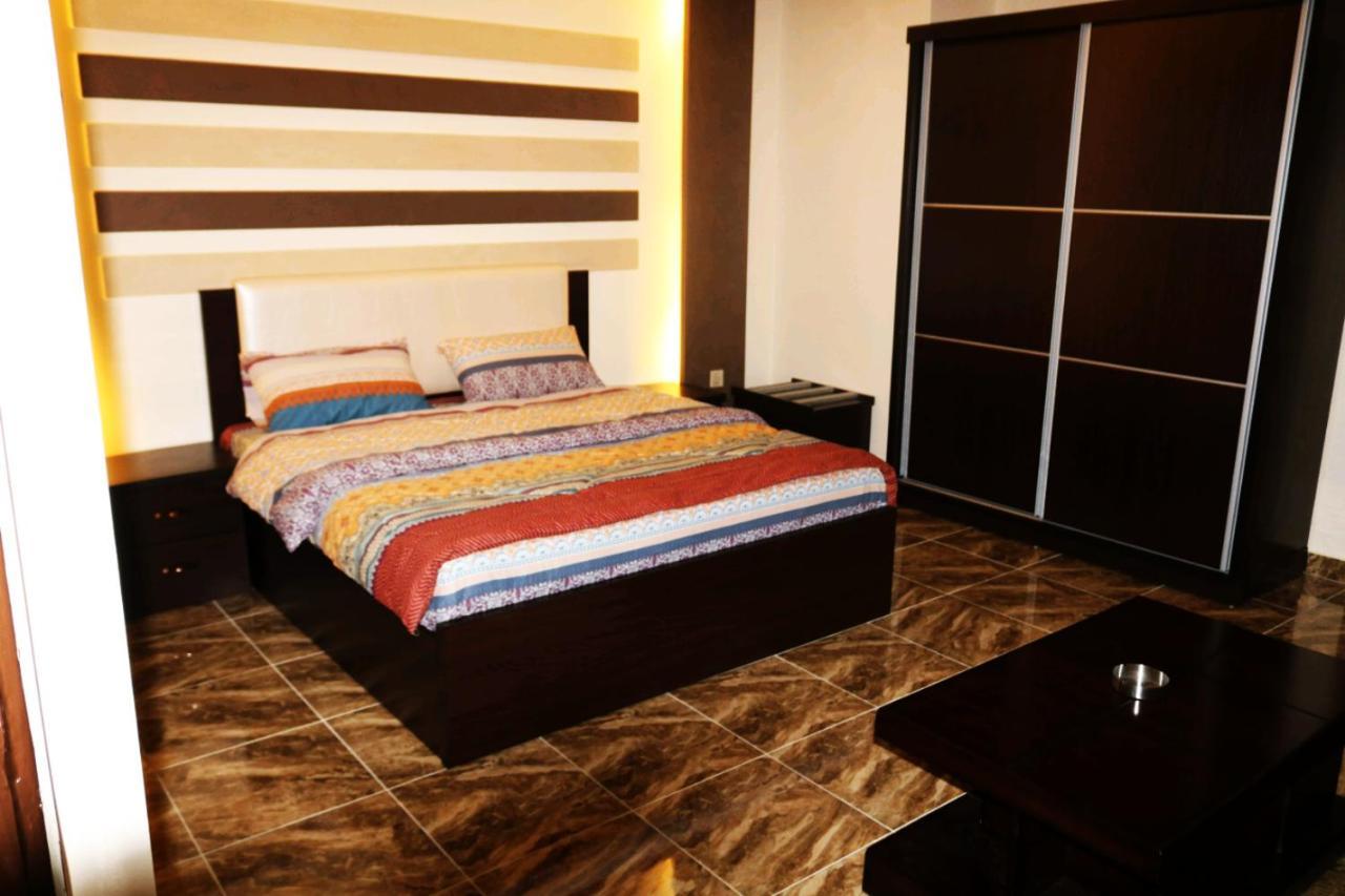 Al Riyati Hotel Apartments Акаба Экстерьер фото