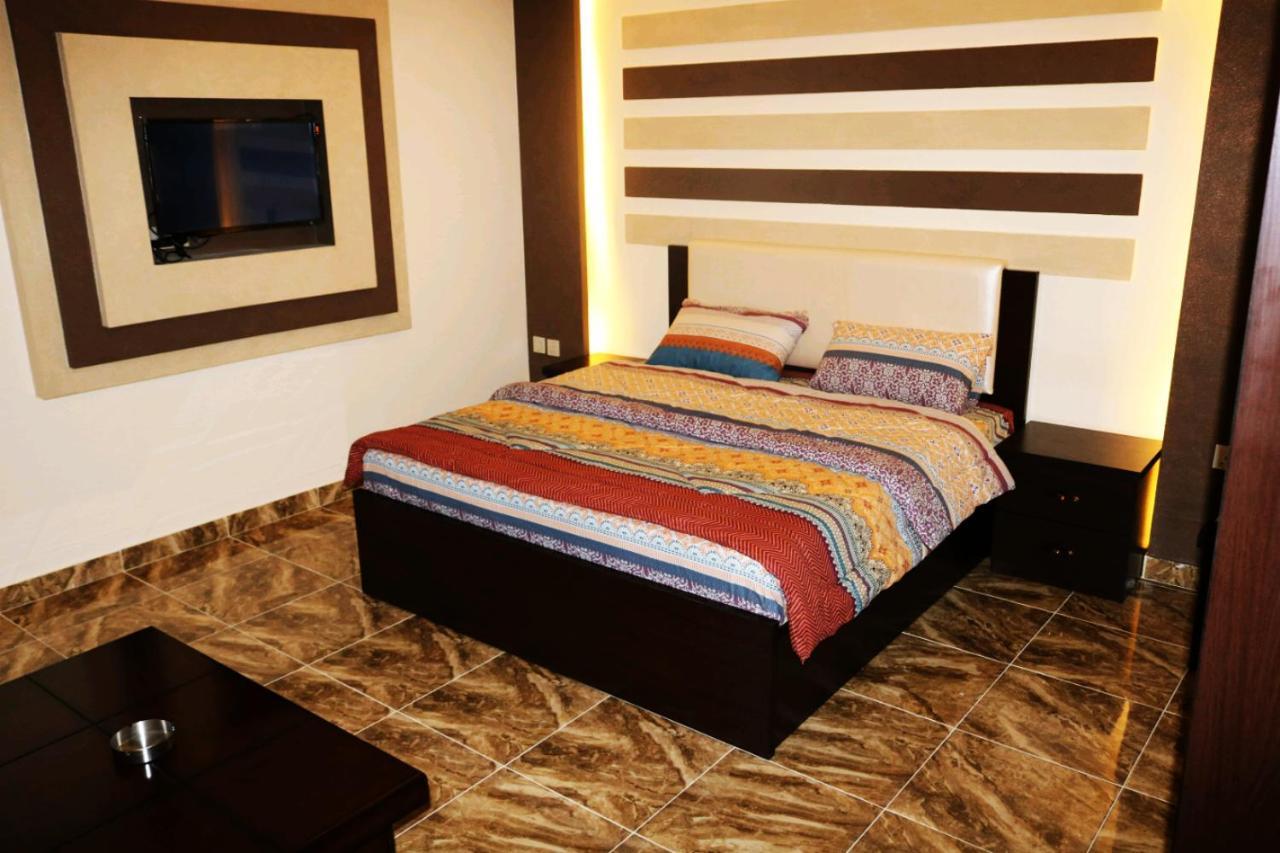 Al Riyati Hotel Apartments Акаба Экстерьер фото