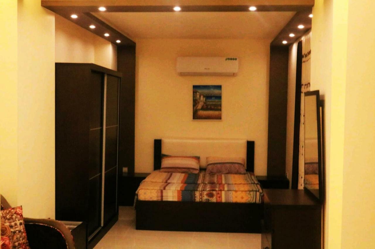 Al Riyati Hotel Apartments Акаба Экстерьер фото
